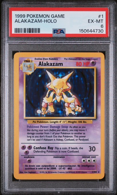 A PSA-graded 1999 Pokemon Game Alakazam-Holo card (#1/102) is encased in a slab, rated EX-MT 6, showing the Psychic-type Pokemon with 80 HP and its 'Damage Swap' Poke-Power.