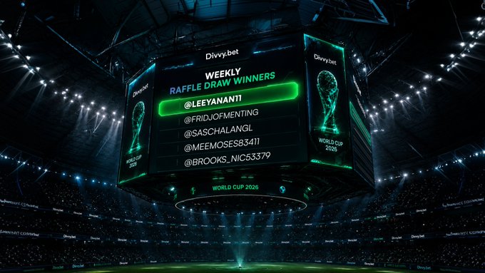 A jumbotron in a stadium displays a Divvy.bet "Weekly Raffle Draw Winners" screen for World Cup 2026, listing usernames such as @LEEYANAN11 (highlighted in green), @FRIDJOFMENTING, @SASCHALANGL, @MEEMOSES3411, and @BROOKS_NIC53379, flanked by World Cup trophy graphics.