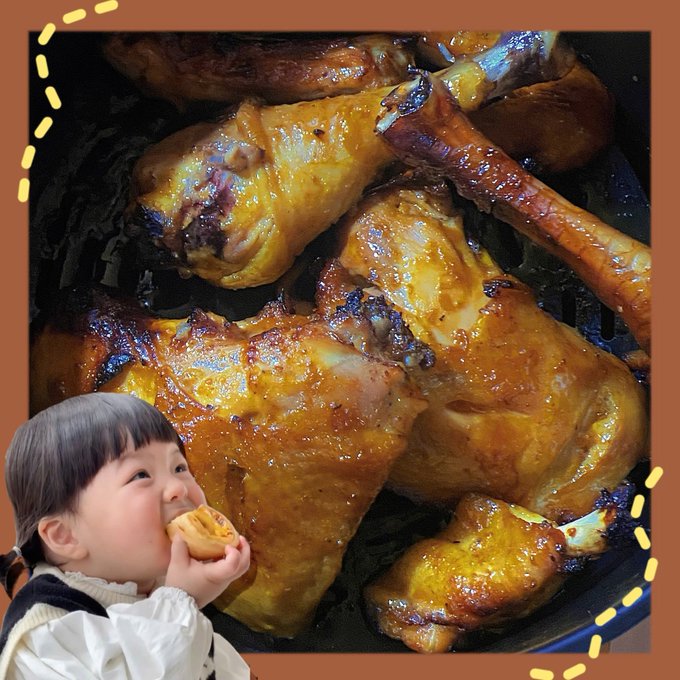 A composite image showing roasted chicken drumsticks in a pan as the background, with a photo of a young child in a white jacket eating a small pastry overlaid in the corner, all framed by a brown border with yellow dashed lines.