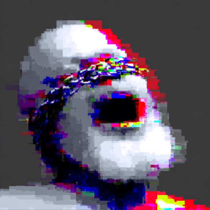 A heavily glitched, pixelated image showing a distorted figure with red, green, and blue color separation effects, resembling a corrupted digital portrait.