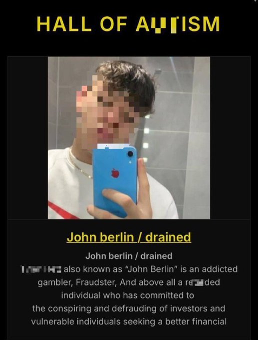 A 'Hall of Autism' post featuring a pixelated selfie of a person in a bathroom holding a blue iPhone. The text reads 'John berlin / drained' and describes the individual as 'an addicted gambler, Fraudster, And above all a retarded individual who has committed to the conspiring and defrauding of investors and vulnerable individuals seeking a better financial'.