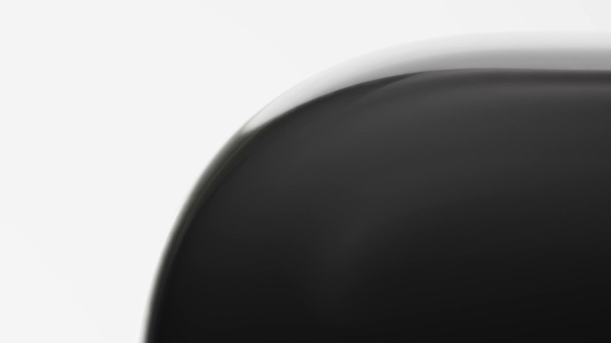 The image features a close-up view of an object, possibly a chair or a table, with a black and white color scheme. The object has a curved edge that adds visual interest to the scene. In the background, there are some text elements such as "We're replacing @YouKnowEno on the Solana Eco Call w/ this btw" which suggests that the image might be related to an advertisement or promotional material for a product or service. The overall composition of the image and its context make it appear to be part of a marketing campaign, with the focus on the black and white object in the foreground.