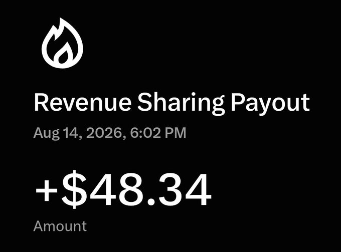 A black screen displaying a 'Revenue Sharing Payout' notification dated Aug 14, 2026, 6:02 PM for the amount of +$48.34, with a flame icon at the top.