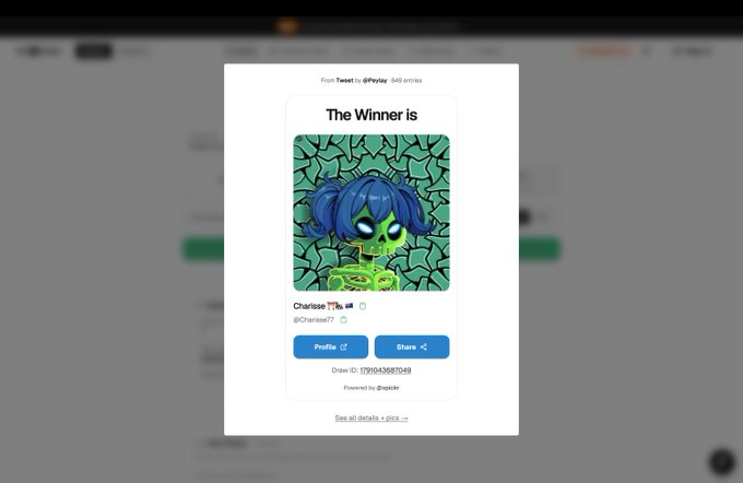 A 'The Winner is' notification modal from a Pixlr giveaway displaying a digital artwork of a character with blue hair and green skin, awarded to @charissee77.