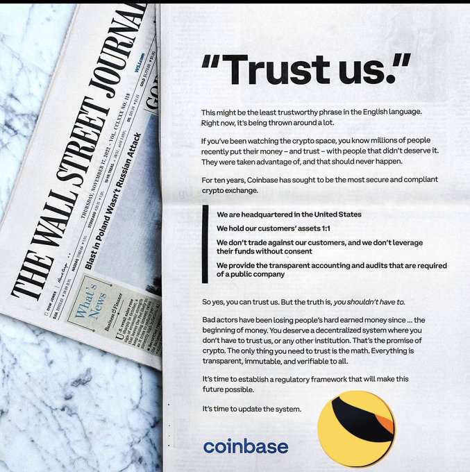 An advertisement showing The Wall Street Journal newspaper next to text beginning with 'Trust us,' promoting Coinbase as a regulated crypto exchange.