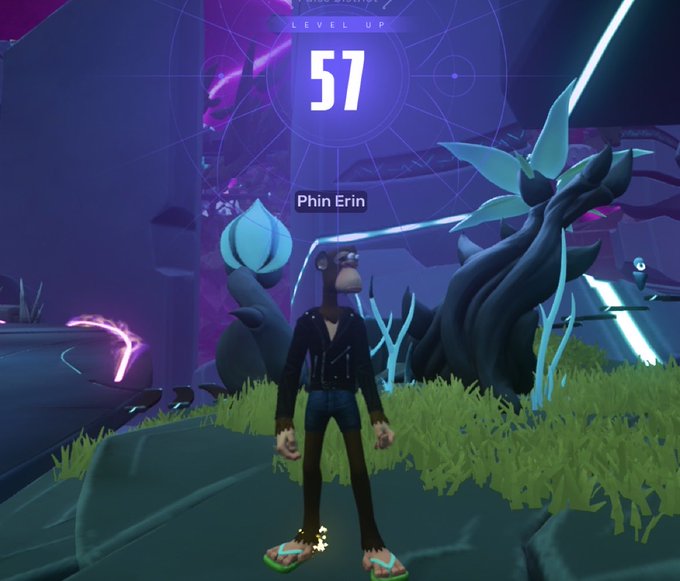 A video game character with an ape-like avatar stands in a stylized fantasy environment after reaching Level 57, with the name 'Phin Erin' displayed below the level-up notification.