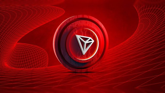 A glowing red 3D rendering of the TRON (TRX) cryptocurrency logo, featuring its signature triangular emblem set against a dark circular coin with flowing wireframe patterns in the background, visually reinforcing the post's message about strong stablecoin growth on the TRON blockchain.