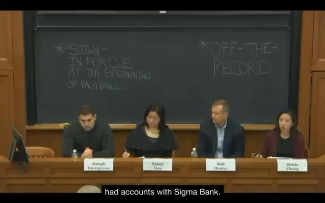 The image shows a group of people sitting around a table, with one person at the head of the table holding a chalkboard marker. The chalkboard has writing on it that says "Off-the-Record" and "Sig.". The people are engaged in what appears to be a discussion or meeting related to off-the-record information about Sigmabank.
