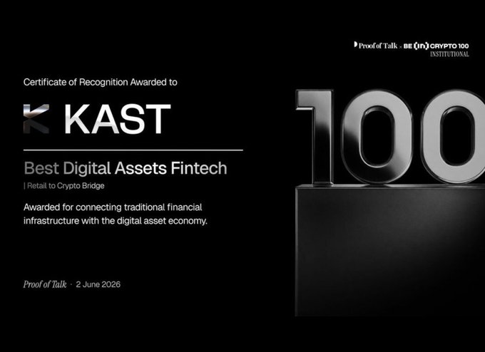 The image features an award certificate for Best Digital Assets Fintech presented against a black background with white text. The text reads "Best Digital Assets Fintech" and "A well deserved achievement for the entire KAST team". The award is presented in silver, making it stand out against the black background. The text also mentions that the award was given to "KAST", which further emphasizes the significance of this recognition.