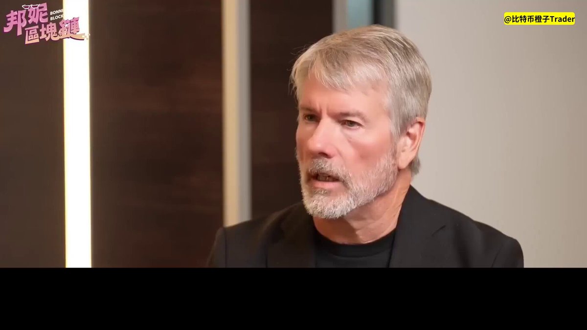 The image features an older man wearing a black suit jacket sitting across from another person who appears to be him. The man is talking or interacting with someone else in the picture. There's no text visible in the image, so we cannot determine what they are discussing directly. However, considering that the post says Michael @saylor explained the logic behind Bitcoin sales and balance sheet values, it could potentially be related to Bitcoin or a similar digital currency topic, which might involve buying, selling or understanding the value of Bitcoins.