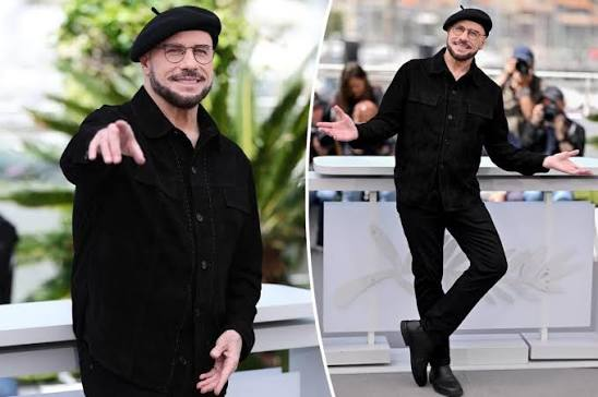 A man wearing a black beret, glasses, and an all-black outfit poses at what appears to be a photocall, with a Cannes Film Festival backdrop visible behind him. The post about Starknet does not appear directly related to the image content, which shows a film event rather than any Starknet branding or text.