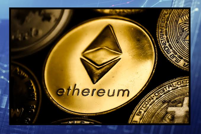 Close-up of a gold Ethereum (ETH) coin surrounded by other cryptocurrency tokens, with the word 'ethereum' engraved on it.
