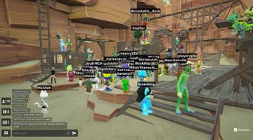 A crowded multiplayer game scene with many colorful player avatars and floating username tags in a canyon-like environment.