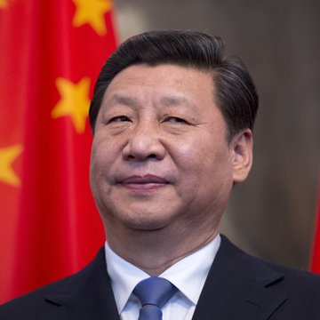 The image shows Chinese President Xi Jinping standing in front of a Chinese flag, accompanying a news update regarding China's effort to claim over $5 billion in seized Bitcoin held in the UK.