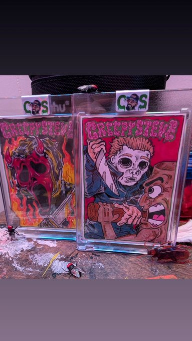 Two "CREEPYSTEVE" sketch cards are displayed in protective sleeves, featuring vibrant horror-themed artwork—one depicting a flaming skull and the other showing a masked figure stabbing a screaming victim, with "GS" logos visible on the holder—reflecting the artist's gratitude as they share their original NFT-inspired creations with their community.