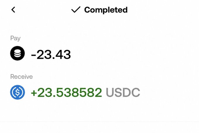 A completed cryptocurrency transaction showing a payment of -23.43 (Pay) and a receipt of +23.538582 USDC (Receive).