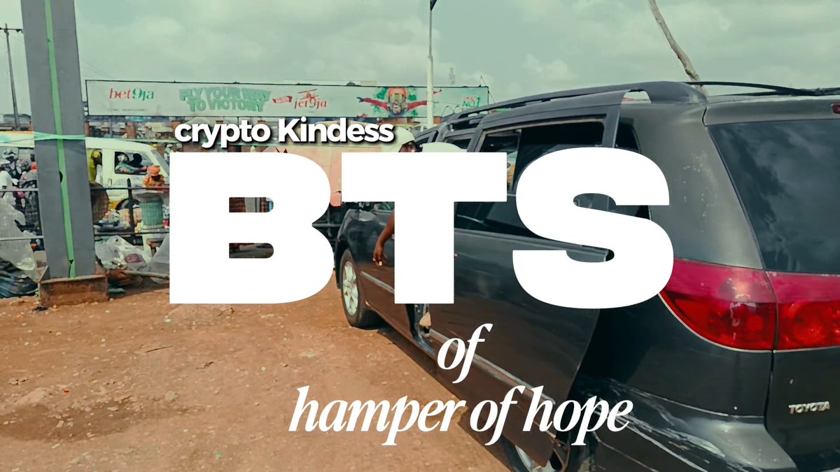 Text overlay reads 'crypto Kindness BTS of hamper of hope' over footage of a black Toyota SUV parked in a dusty lot near a building advertising 'bet9ja'.