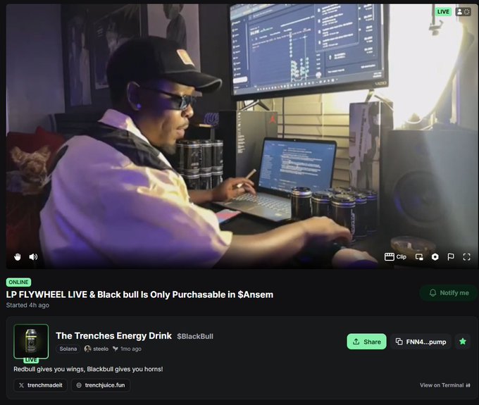 A live Twitch stream titled 'LP FLYWHEEL LIVE & Black bull Is Only Purchasable in $Ansem' shows a man in a black cap and glasses coding at a multi-monitor setup with energy drink cans, promoting 'The Trenches Energy Drink' ($BlackBull) with the tagline 'Redbull gives you wings, Blackbull gives you horns!'