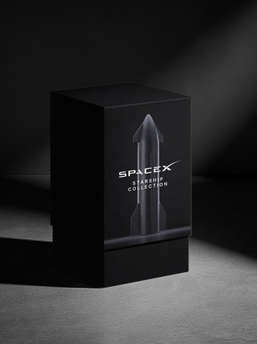A sleek black box labeled "SPACEX STARSHIP COLLECTION" displays a subtle rocket graphic on its front, photographed in a dark, moody setting.
