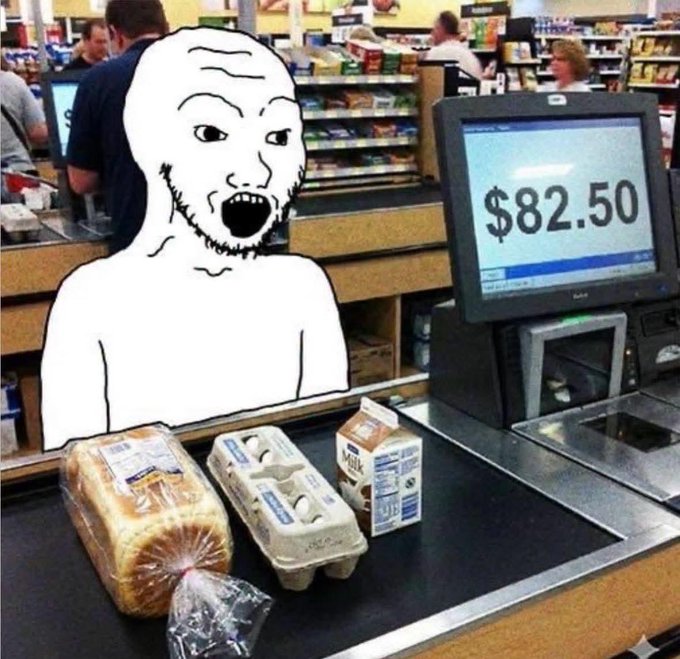 A Wojak meme character with a shocked, screaming expression stands at a grocery store checkout beside a loaf of bread, a carton of eggs, and a carton of milk, while the register screen displays a total of $82.50.