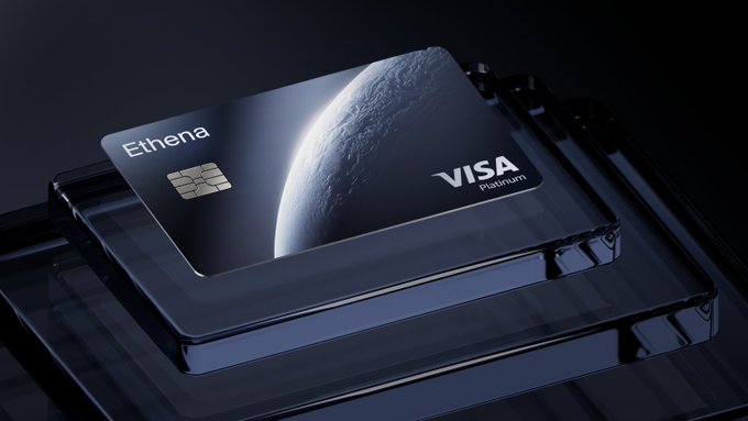 A sleek black metal credit card labeled "Ethena" with "VISA Platinum" branding is displayed on a dark reflective surface. The futuristic, space-themed design aligns with the post's message of "Spend anywhere. Earn on every purchase," visually conveying the card's premium, borderless appeal.