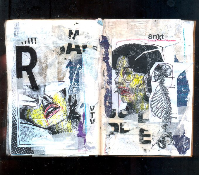 An open mixed-media art journal spread featuring collage work with text 'anxt', 'R', and 'M' alongside illustrated faces rendered in yellow, black, and blue tones.
