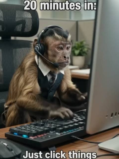 A meme showing a capuchin monkey wearing a headset and business attire at a computer, with text reading '20 minutes in:' and 'Just click things'.