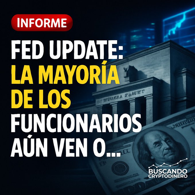 A promotional graphic with Spanish text reading 'INFORME FED UPDATE: LA MAYORÍA DE LOS FUNCIONARIOS AÚN VEN O...', featuring the Federal Reserve building and a $100 bill, branded with 'BUSCANDO CRYPTODINERO'.