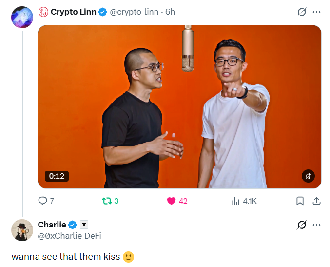 A screenshot of a tweet by Crypto Linn (@crypto_linn) showing a video of two men in front of a microphone with an orange background, with a reply from Charlie (@0xCharlie_DeFi) reading 'wanna see that them kiss 😉' that received 4.1K views.