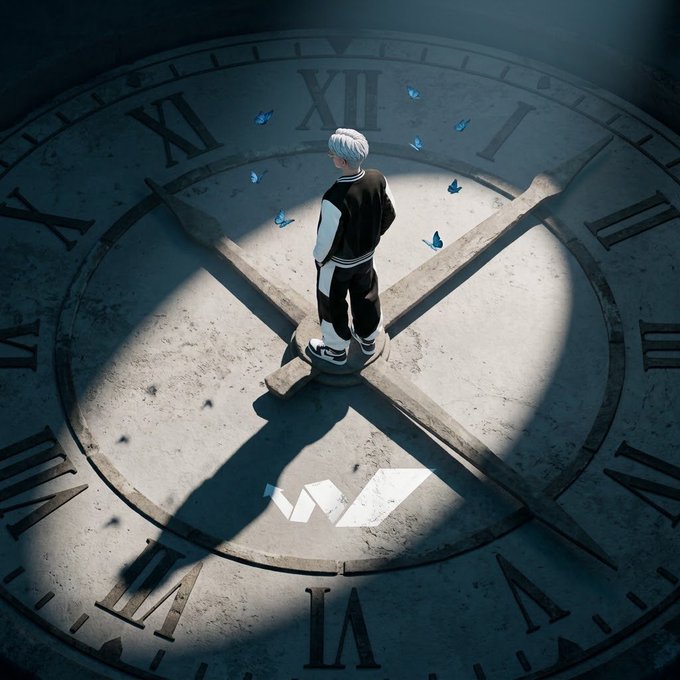 An anime-style illustration of a white-haired figure in a black and white jacket standing on the hands of a giant clock face surrounded by blue butterflies, with a 'W' logo watermark at the bottom.