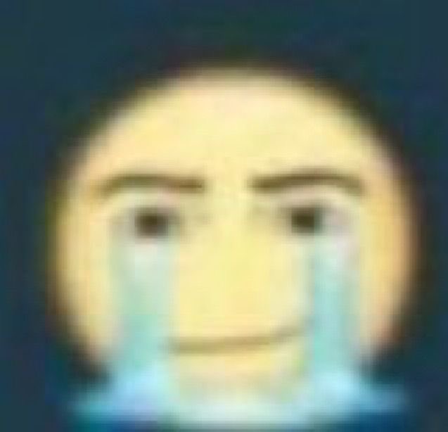 A blurry, low-resolution image of the 'Cursed Emoji' or 'Galaxy Brain' meme, showing a yellow face with an exaggerated grin and wide, staring eyes.