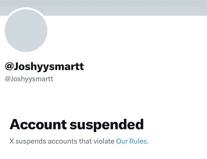 A Twitter/X suspension notice for the account @Joshyysmartt, with the message 'Account suspended' and a note that 'X suspends accounts that violate Our Rules.'