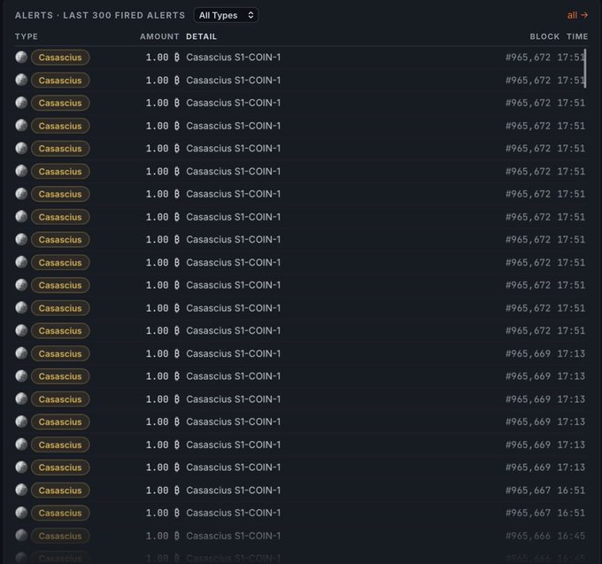 A dark-themed interface displays a list of alerts showing repeated 'Casascius S1-COIN-1' transactions with an amount of '1.00'.