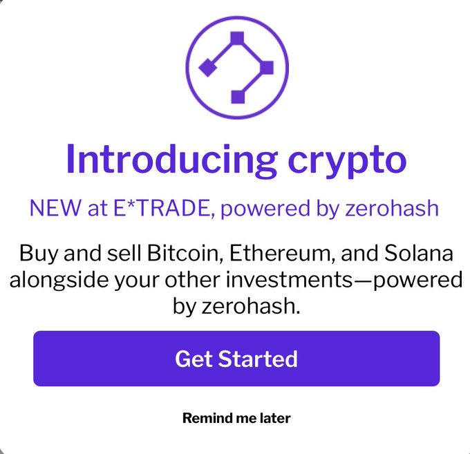 An E*TRADE promotional alert announcing the new ability to buy and sell Bitcoin, Ethereum, and Solana through the platform, powered by zerohash, with a "Get Started" button. The alert directly relates to the post, confirming E*Trade's expansion into cryptocurrency trading.