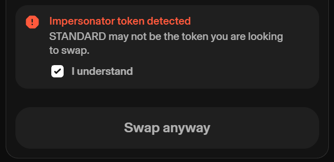 A dark interface warning screen that reads 'Impersonator token detected. STANDARD may not be the token you are looking to swap.' with 'I understand' checked and a 'Swap anyway' button below.