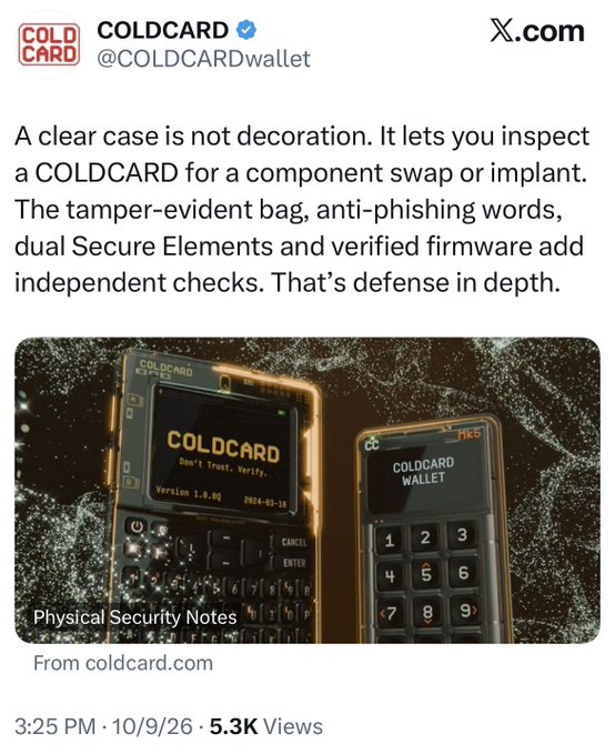 A COLDCARD Wallet tweet (5.3K views, 10/9/26) showcases two COLDCARD hardware wallet devices on a dark, particle-filled background, promoting their "defense in depth" security features including tamper-evident bags, anti-phishing words, dual Secure Elements, and verified firmware. The post captioned "Jesus Christ" likely reflects shock or awe at the elaborate security presentation and the dramatic, almost reverential marketing imagery used to highlight the wallet's physical protection measures.