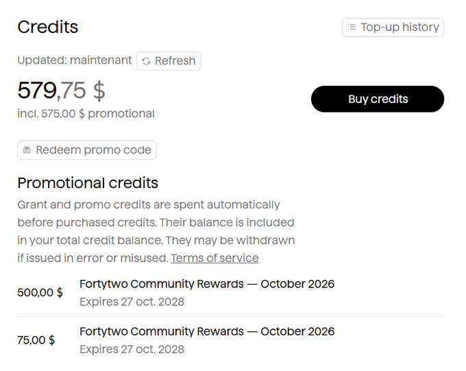 A credits page shows a balance of “579,75 $,” including “575,00 $ promotional,” with buttons for “Buy credits,” “Redeem promo code,” and “Top-up history.”