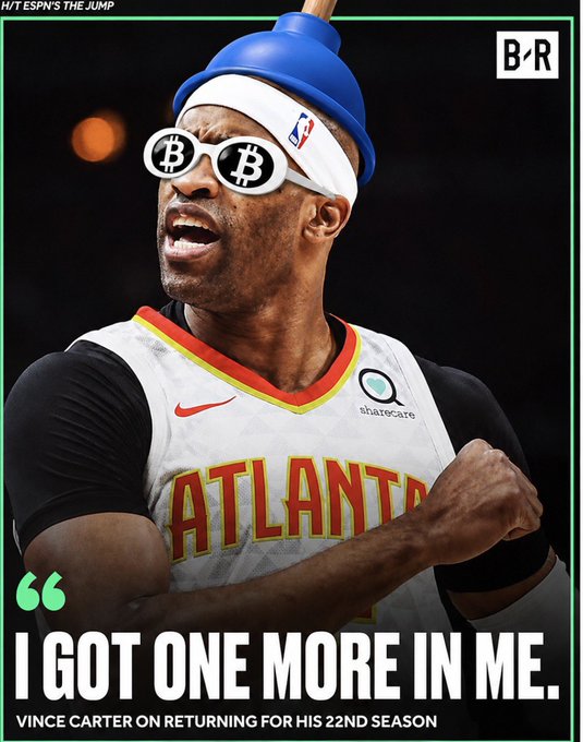 A Bleacher Report graphic shows basketball player Vince Carter in an Atlanta Hawks jersey, edited with novelty sunglasses featuring Bitcoin logos and a hat, with the quote 'I GOT ONE MORE IN ME.' about returning for his 22nd season.