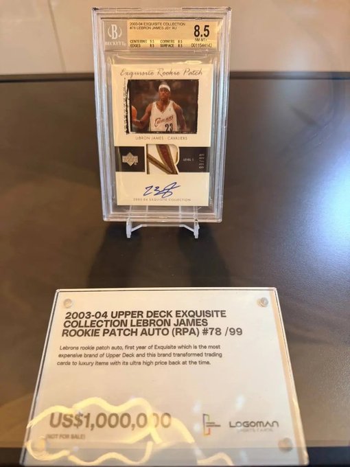 A graded Beckett 8.5 basketball trading card featuring a 2003-04 Upper Deck Exquisite Collection LeBron James Rookie Patch Auto (RPA) #78 /99, displayed on a stand with an information placard indicating it is 'NOT FOR SALE'.
