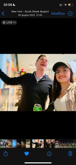 iPhone Photos app screenshot showing a Live Photo from New York - South Street Seaport, dated June 20, 2022 at 21:45, featuring a man in glasses and a woman in a cap smiling together, with the location tagged 'Modica'.