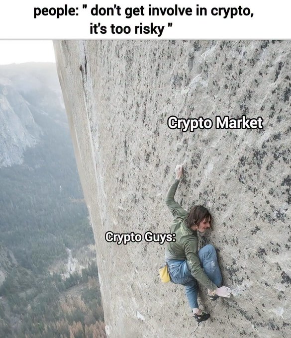 A meme showing a rock climber clinging to a steep cliff face, labeled 'Crypto Guys' climbing 'Crypto Market,' with the caption 'people: "don't get involve in crypto, it's too risky."'
