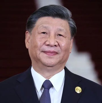 In this image, Xi Jinping, the President of China, is pictured, relevant to the news that China has officially called for the construction of a national blockchain network as part of their economic strategy.