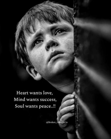 A black and white photo of a young boy peering around a corner with a contemplative expression, accompanied by the quote 'Heart wants love, Mind wants success, Soul wants peace..!!' credited to @Broken_thought_in.