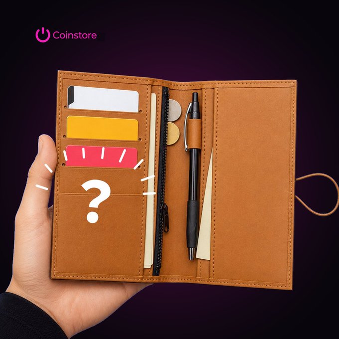 A hand holding open a tan leather wallet with card slots, coins, and a pen, branded with the 'Coinstore' logo and a question mark symbol.