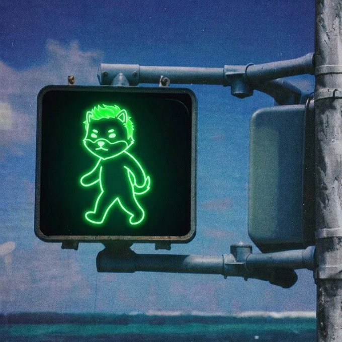A pedestrian crossing signal displays a green walking figure with a dog's face, humorously serving as a "sign" for the Dogelon Mars ($ELON) community, as referenced in the accompanying post.