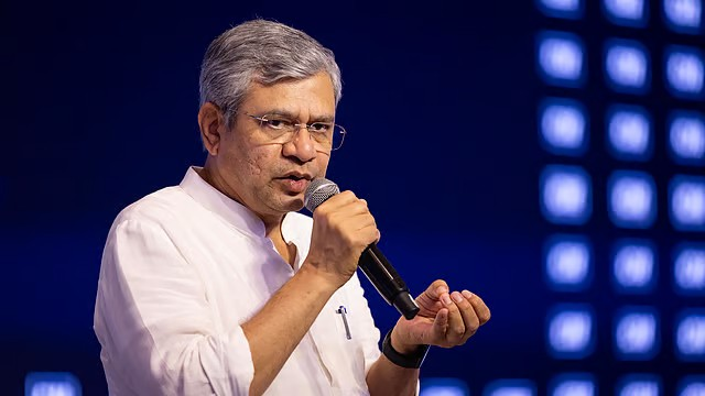 Ashwini Vaishnaw, India's Minister of Electronics and Information Technology, speaks into a microphone, as referenced in the announcement about the upcoming consultation paper on AI regulation.
