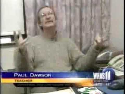 Paul Dawson, a teacher identified in a WNAB 11 news chyron, gestures with both hands raised while speaking during an interview. The post's reference to "the ansem chart" appears unrelated to the image, which shows a typical news interview setup rather than any chart or document.