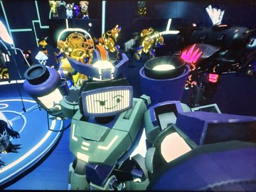 A first-person screenshot from a VR rhythm game showing a robot character with a screen face in a neon-lit virtual arena.