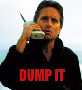 A meme image featuring Michael Douglas from the movie Wall Street holding an old cell phone, with the red text 'DUMP IT' overlaid at the bottom.