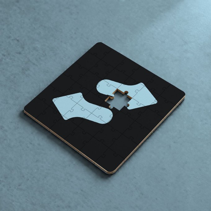 A nearly completed jigsaw puzzle sits on a gray surface, but one piece is missing from the center of a light blue shape, creating a visible gap that symbolizes something being incomplete or lacking.